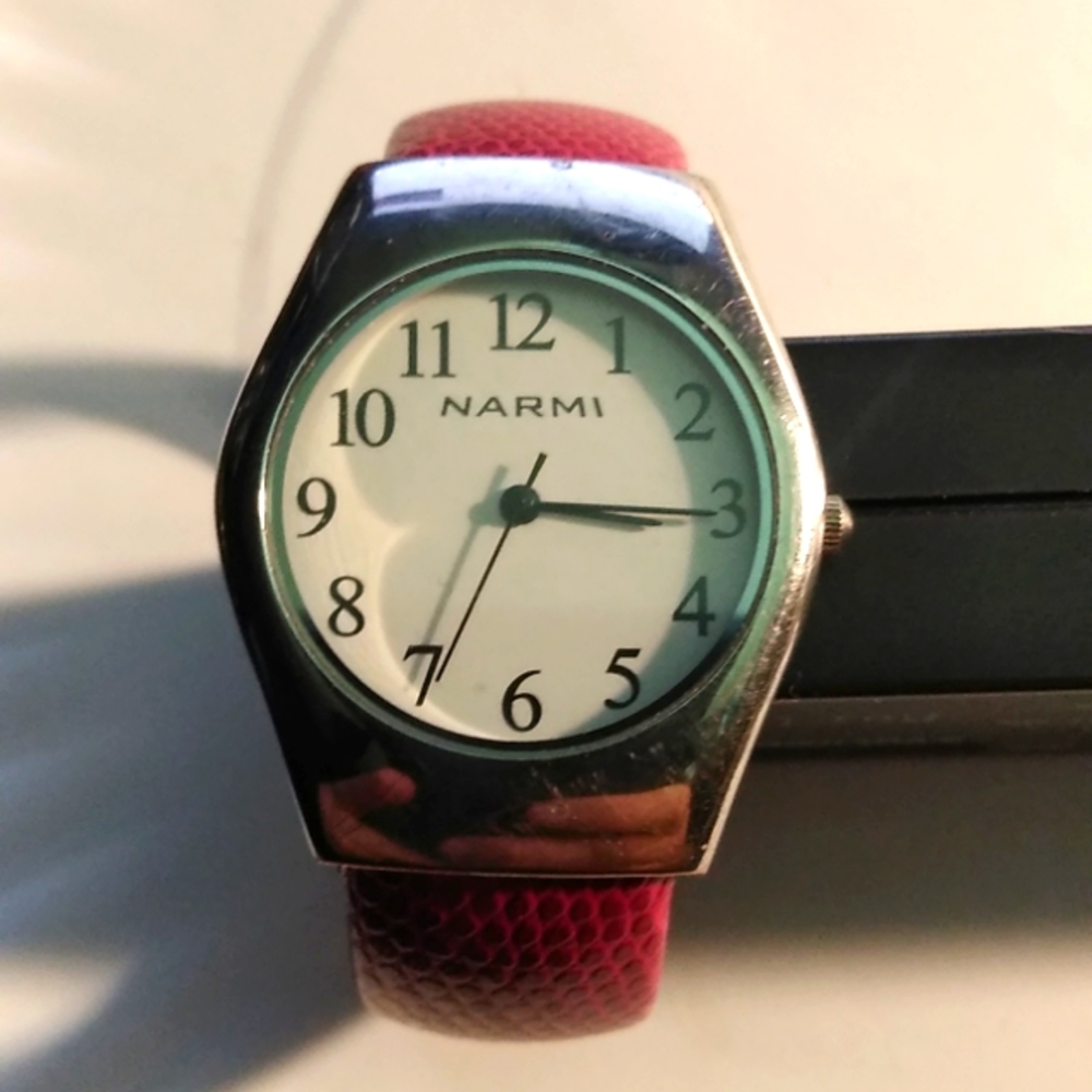 Jazzy Women’s red and silver tone statement watch